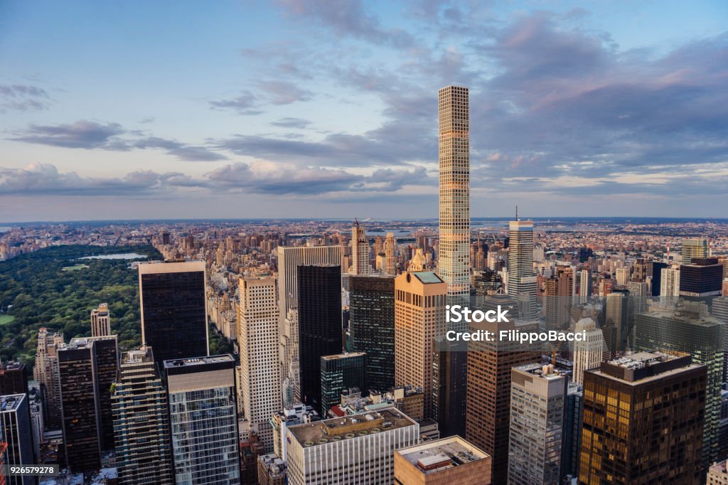 432 Park Avenue Skyscraper and Central Park in New York Public Park Stock Photo