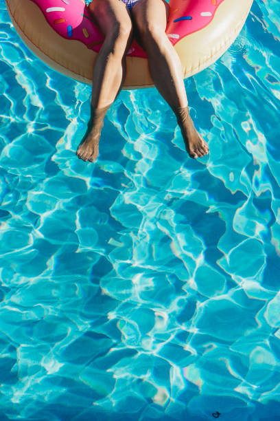 istock Woman resting on inflatable during vacation 926579950