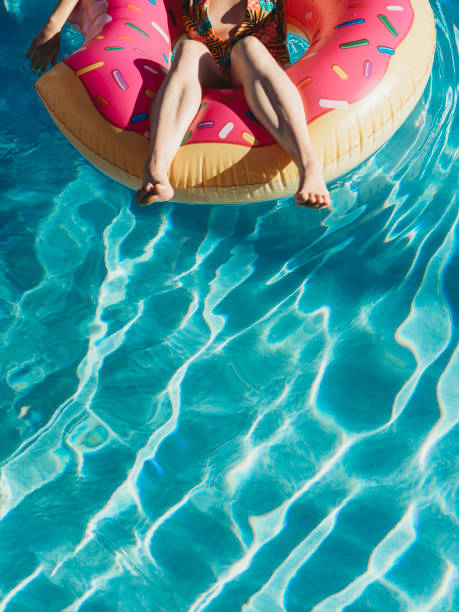 istock Woman resting on inflatable during vacation 926579998