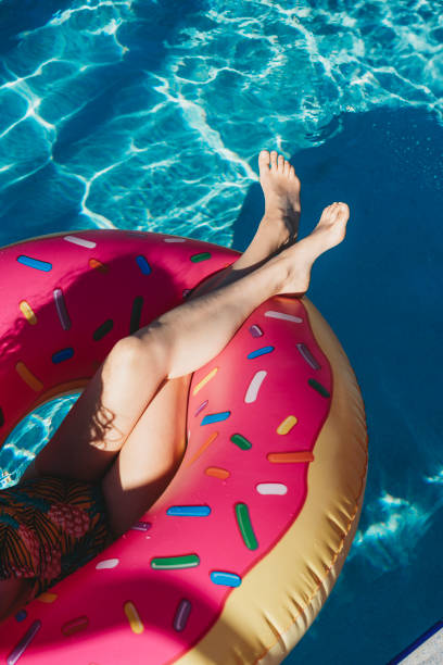 istock Woman resting on inflatable during vacation 926580008