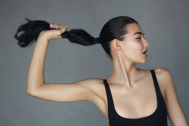 Fashion woman with ponytail stock photo