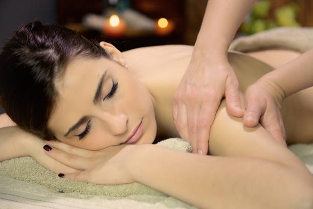 istock Beautiful woman in spa getting massage 926586888