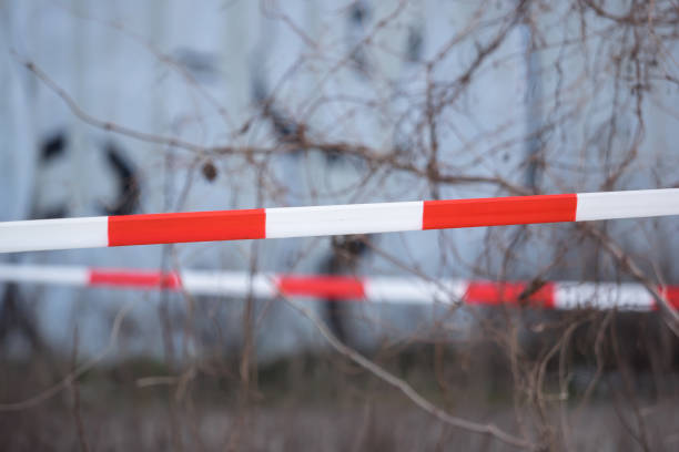 istock A barrier tape flutters out in the wind 926590912
