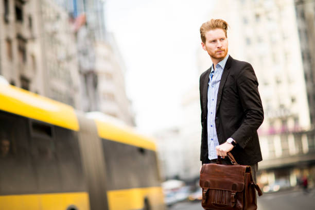 istock Young businessman standing on the street 926591112