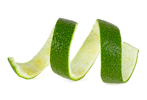 istock Peel of lime over white background, closeup 926602438