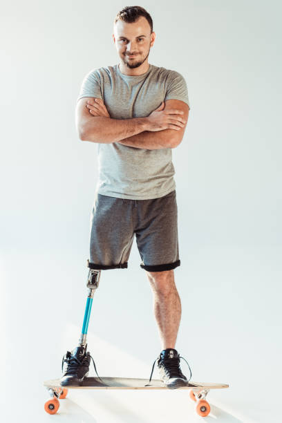 istock man with leg prosthesis standing on skateboard 926602580