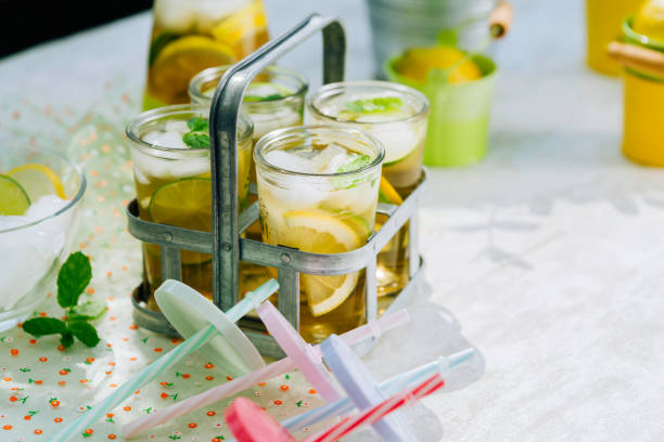 istock Ice Tea with Fresh Limes and Lemon Fruits 926609844