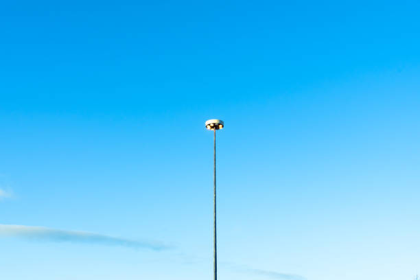 istock Street light at a crossroads against sky at sunset 926610444