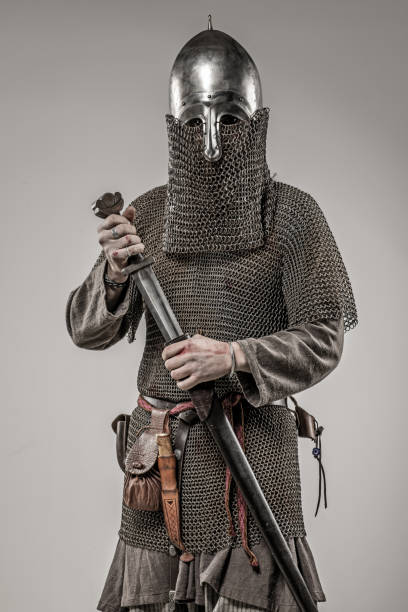 istock Weapon wielding bloody viking warrior soldier alone in studio shoot 926613826