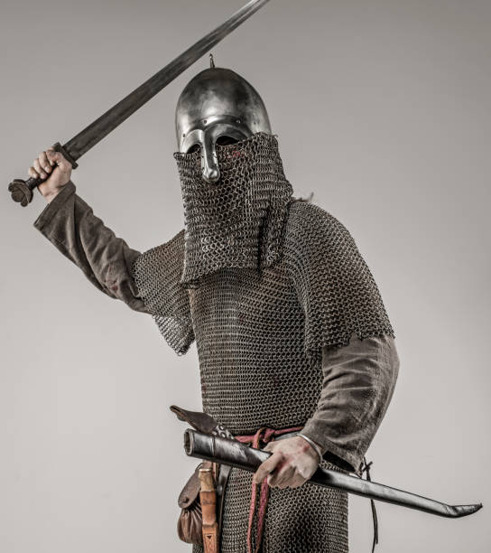 istock Weapon wielding bloody viking warrior soldier alone in studio shoot 926613828