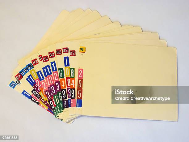 A Pile Of Numbered Medical Files On A White Background Stock Photo - Download Image Now