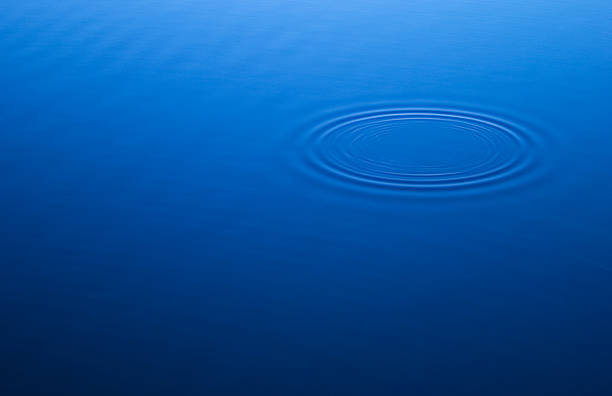 istock Ripples on a placid lake 92661820