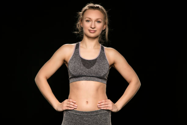 istock athletic woman shows her shapely body, close-up 926621670