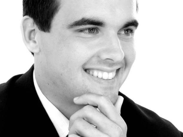 istock Attractive Young Businessman In Suit Smiling 92663483