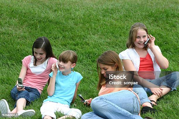 Girls On Cell Phones Stock Photo - Download Image Now - Adolescence, Adult, American Culture
