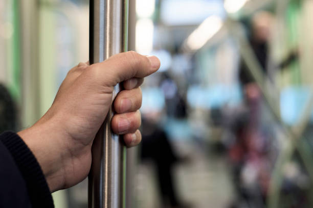 istock young man in a train car or subway 926637346
