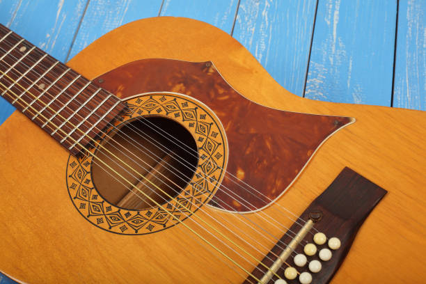 istock Musical instrument - Bridge and pins twelve-string acoustic guitar 926637376