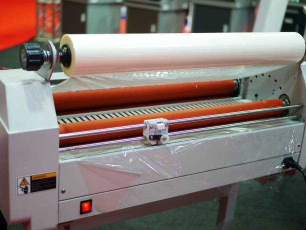 Laminating machine Laminating machine rolling stock stock pictures, royalty-free photos & images