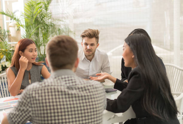 istock Young professionals work in modern office.Project manager team discussing new idea 926641364