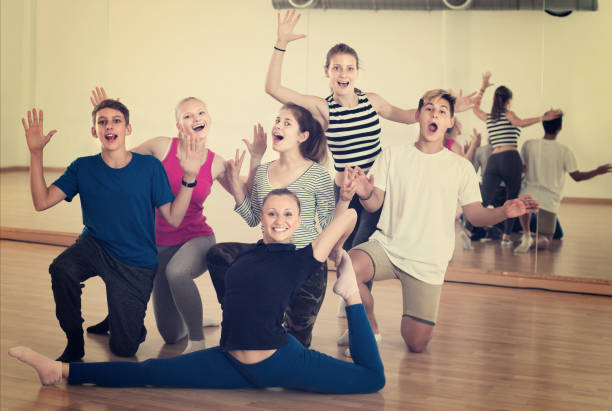 istock Happy teen with teacher in dance studio smiling 926641600