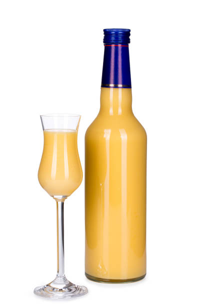 istock Bottle and glass of egg liqueur isolated on white background 926644380