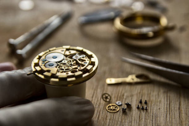 istock Process of installing a part on a mechanical watch, watch repair 926650008