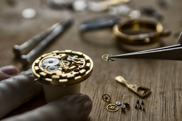 istock Process of installing a part on a mechanical watch, watch repair 926653580