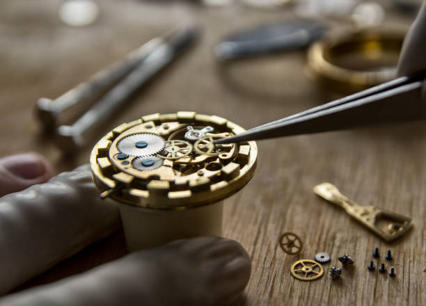 istock Process of installing a part on a mechanical watch, watch repair 926653698