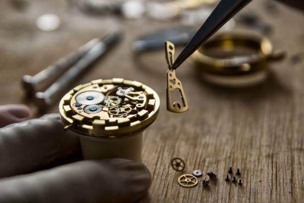 istock Process of installing a part on a mechanical watch, watch repair 926653924