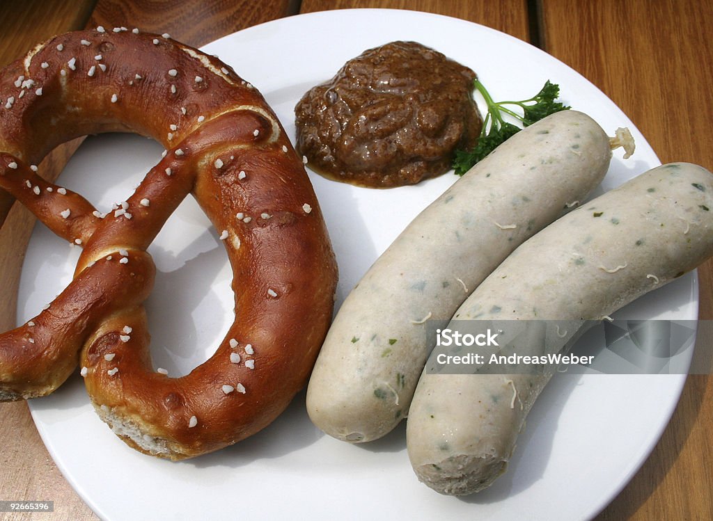Weisswurst, Pretzel & sweet mustard - Bavarian veal sausage, Prezel, mustard  Appetizer Stock Photo