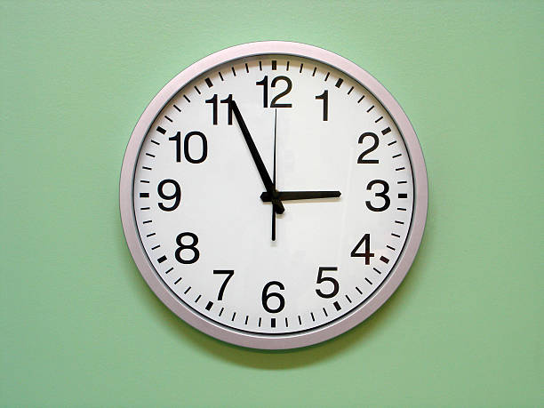 istock Analogue wall clock with black detail on white 92665569