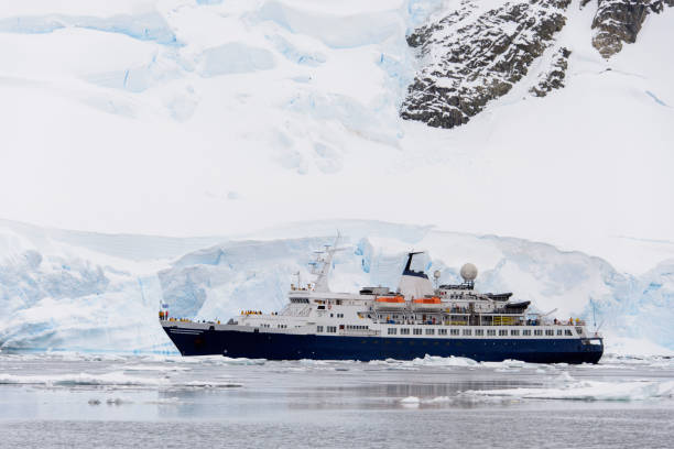 Expedition ship in Antarctic sea stock photo