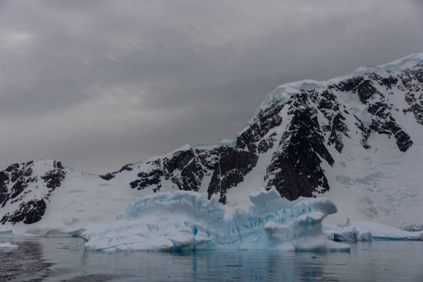 istock Iceberg in Antarctic sea 926668516