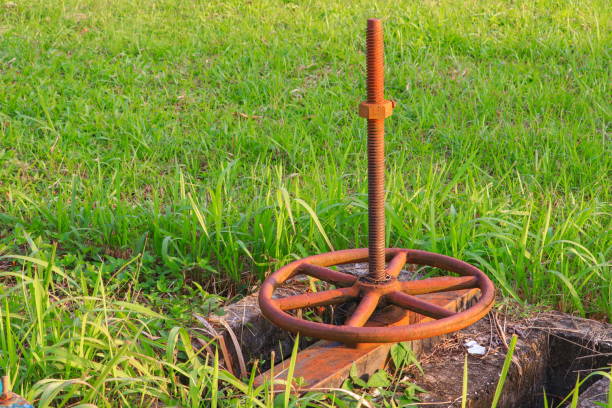 Old water valve and rusty on the grass