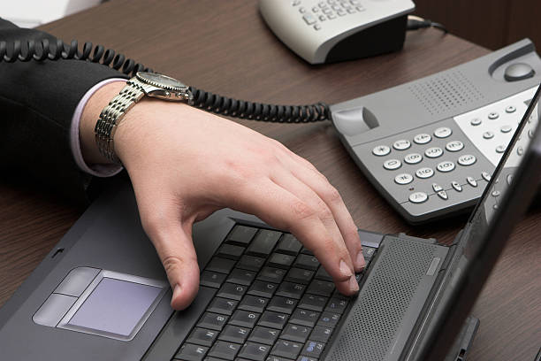 istock young businessman with a laptop 92667688