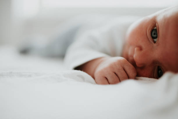 istock Newborn baby boy lying on a blanket 926677594