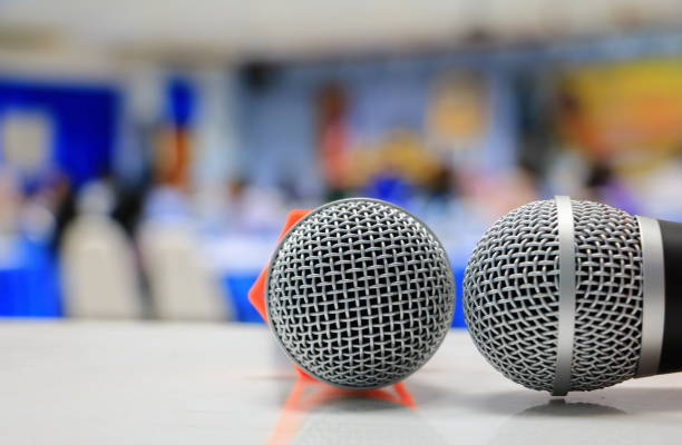 istock microphone wireless in a meeting room seminar conference background 926677902