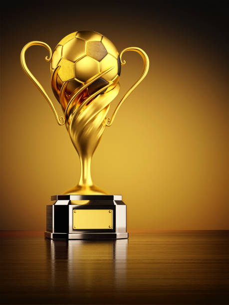 Close-up of a gold trophy photographed with a very shallow depth of field.