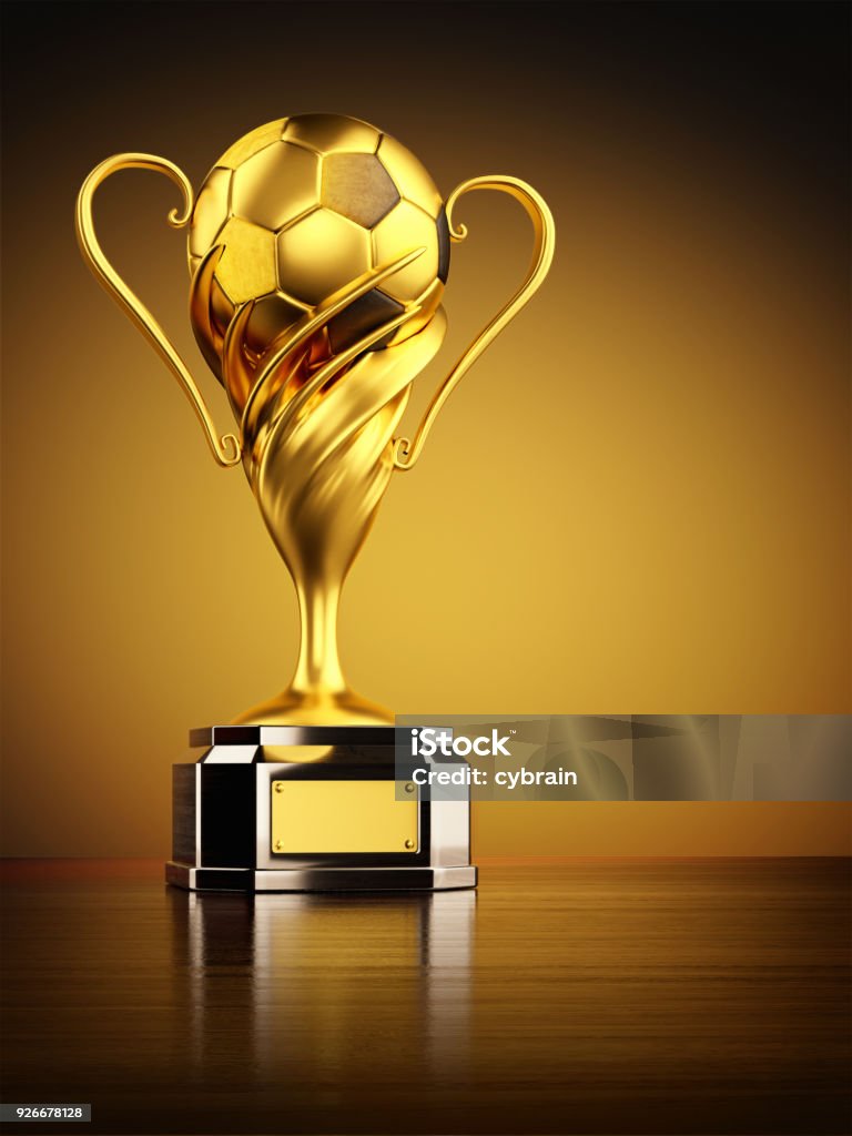 Gold trophy as championship award Football winner cup with golden soccer ball on yellow background Trophy - Award Stock Photo