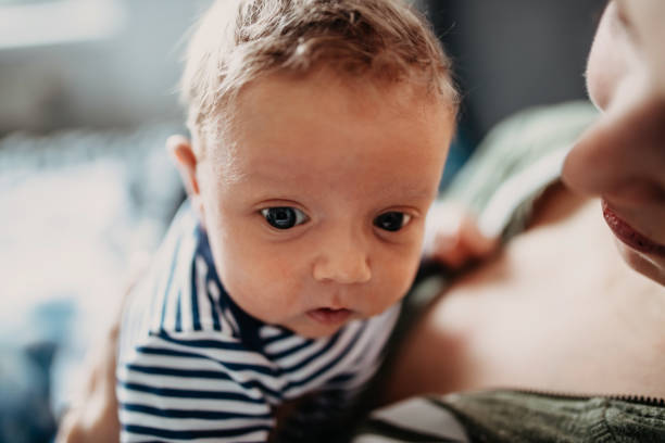 istock Newborn baby boy with mom 926681770