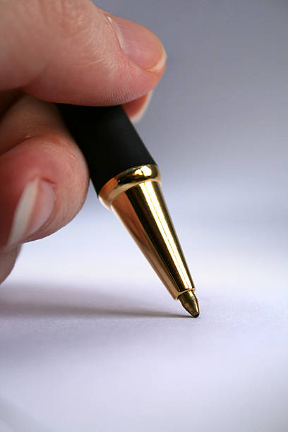 istock Autograph: Person holding pen about to write 92668515