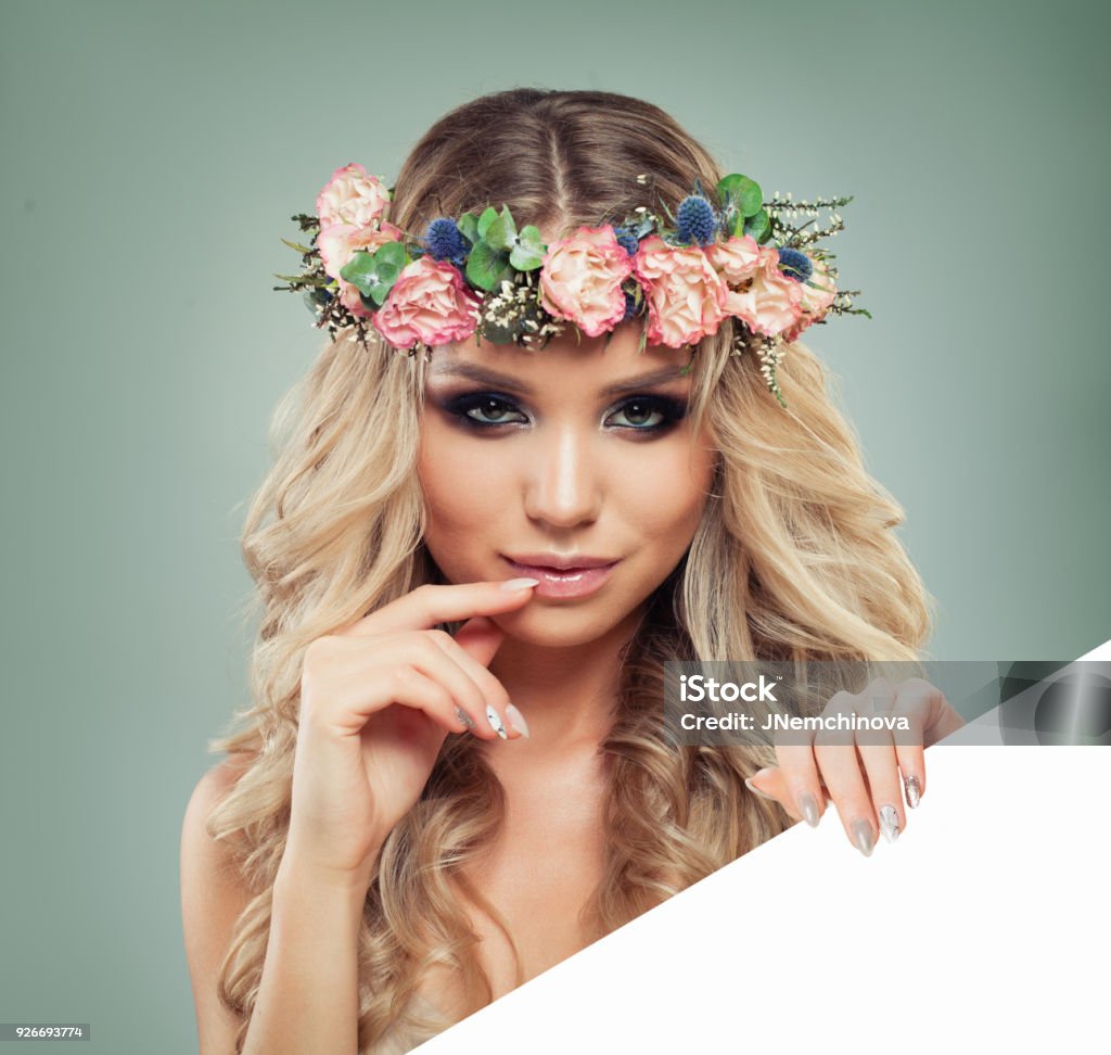 Spring Woman With Flowers Hairstyle Holding White Banner For Text Blonde  Beauty Fashion Model With Long Permed Curly Hair And Perfect Makeup Stock  Photo - Download Image Now - iStock