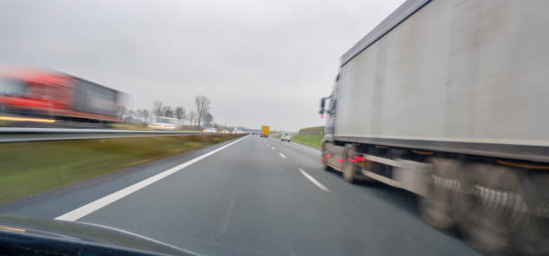 overtake trucks at high speed on the motorway