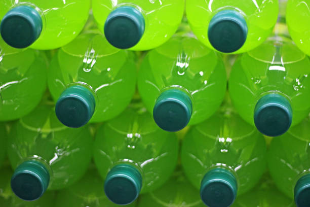 Recycling concept made of green plastic bottle caps