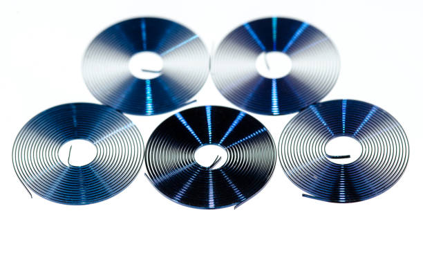 Five Pocket Watch Hairsprings on a White Background