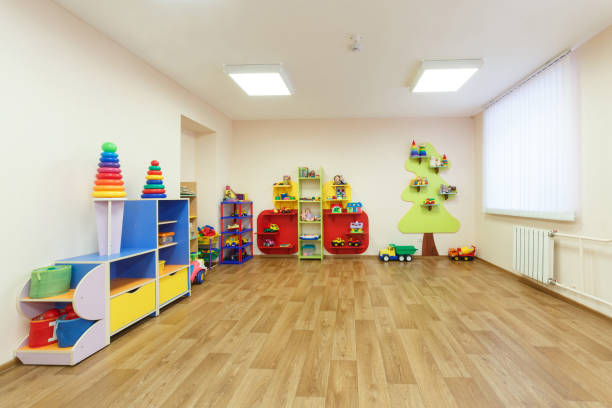 istock Spacious light pink colored game room with in the kindergarten 926723372