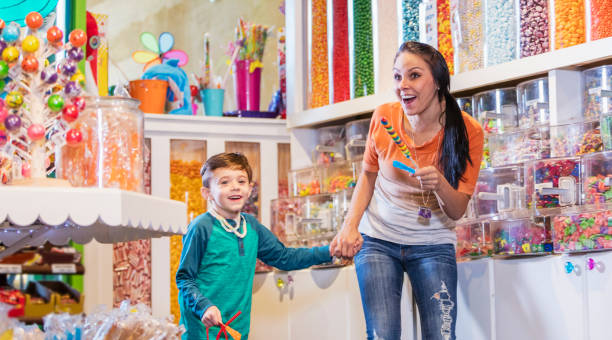 istock Boy and mother in candy store 926726322
