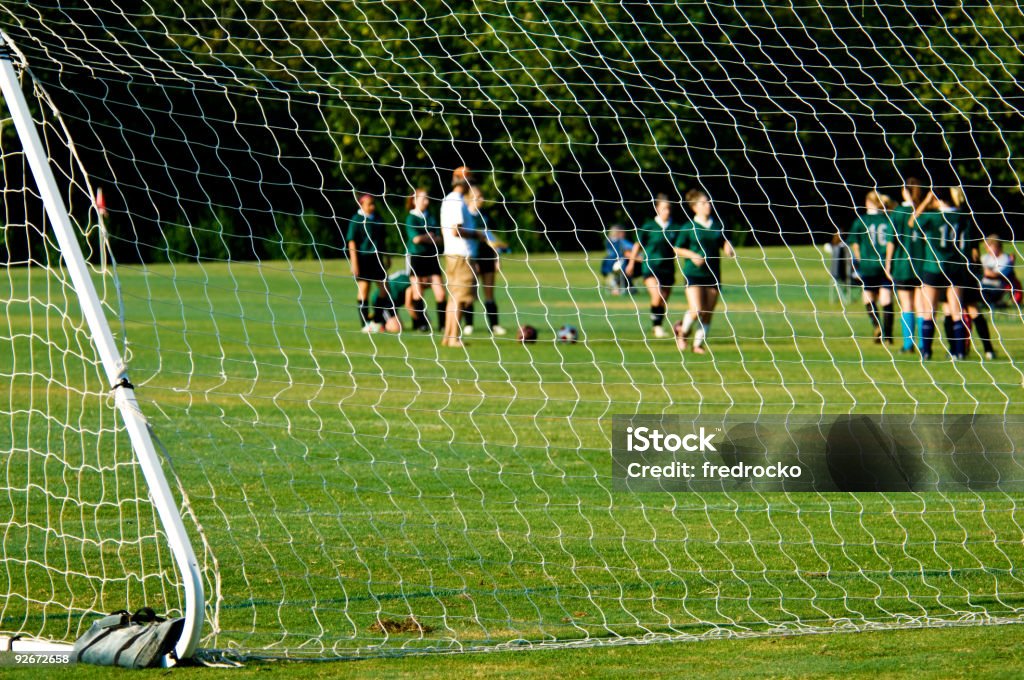 Soccer Players jugando al fútbol en el campo de fútbol con pelota de fútbol - Foto de stock de Abstracto libre de derechos