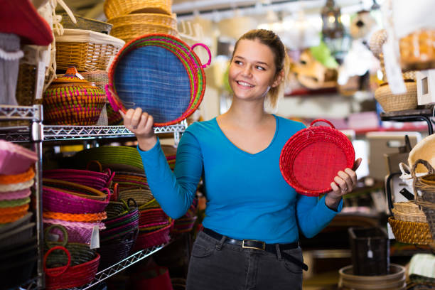 istock Female choosing colour wicker basket 926733896