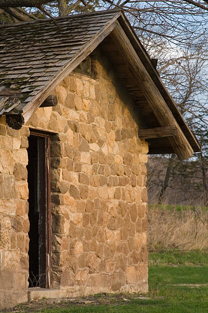 istock door in rock building 92673868